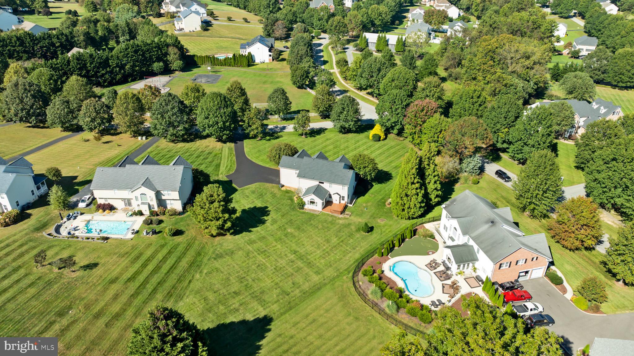 3300 Lancer Court Dunkirk, MD 20754 - Photo 78 of 89 an aerial view of a house with yard swimming pool and outdoor seating