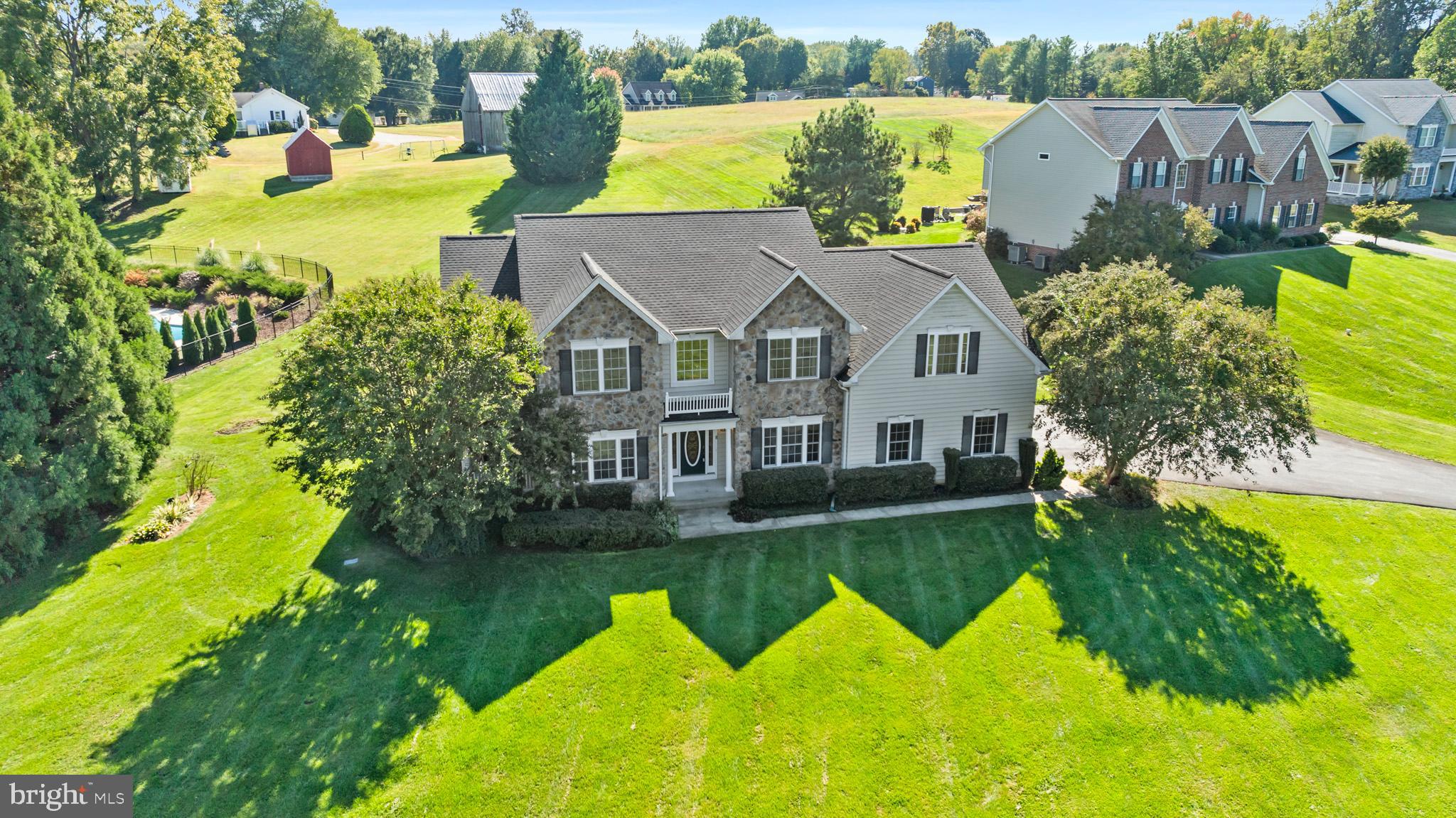 3300 Lancer Court Dunkirk, MD 20754 - Photo 80 of 89 an aerial view of a house with swimming pool garden and patio