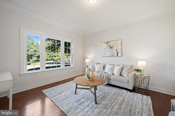 a kitchen with a sink cabinets and window