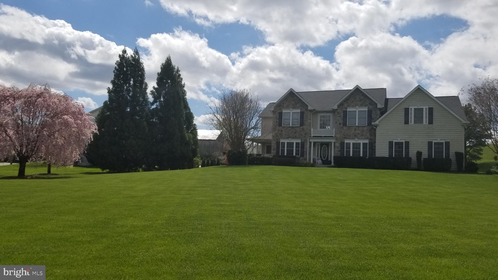 3300 Lancer Court Dunkirk, MD 20754 - Photo 82 of 89 a view of a big house with a big yard and large trees
