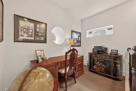a view of a workspace with furniture