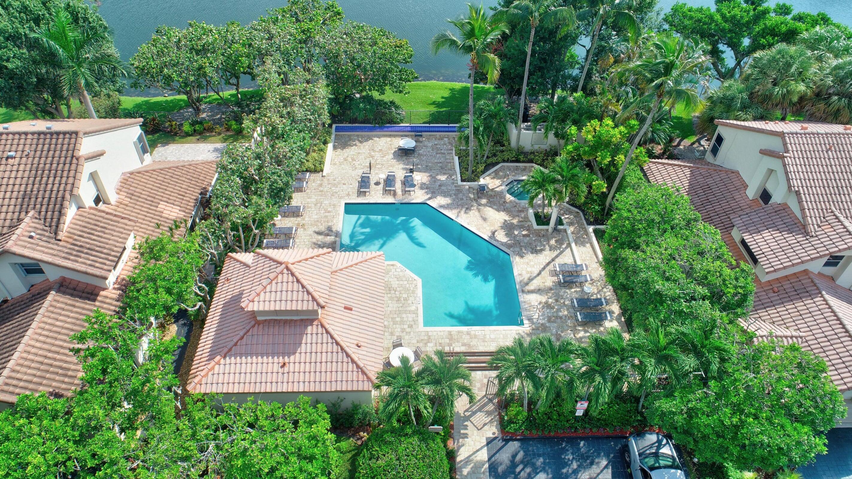 5205 Majorca Club Drive Boca Raton, FL 33486 - Photo 3 of 29 Clubhouse Pool Overlooks Lake