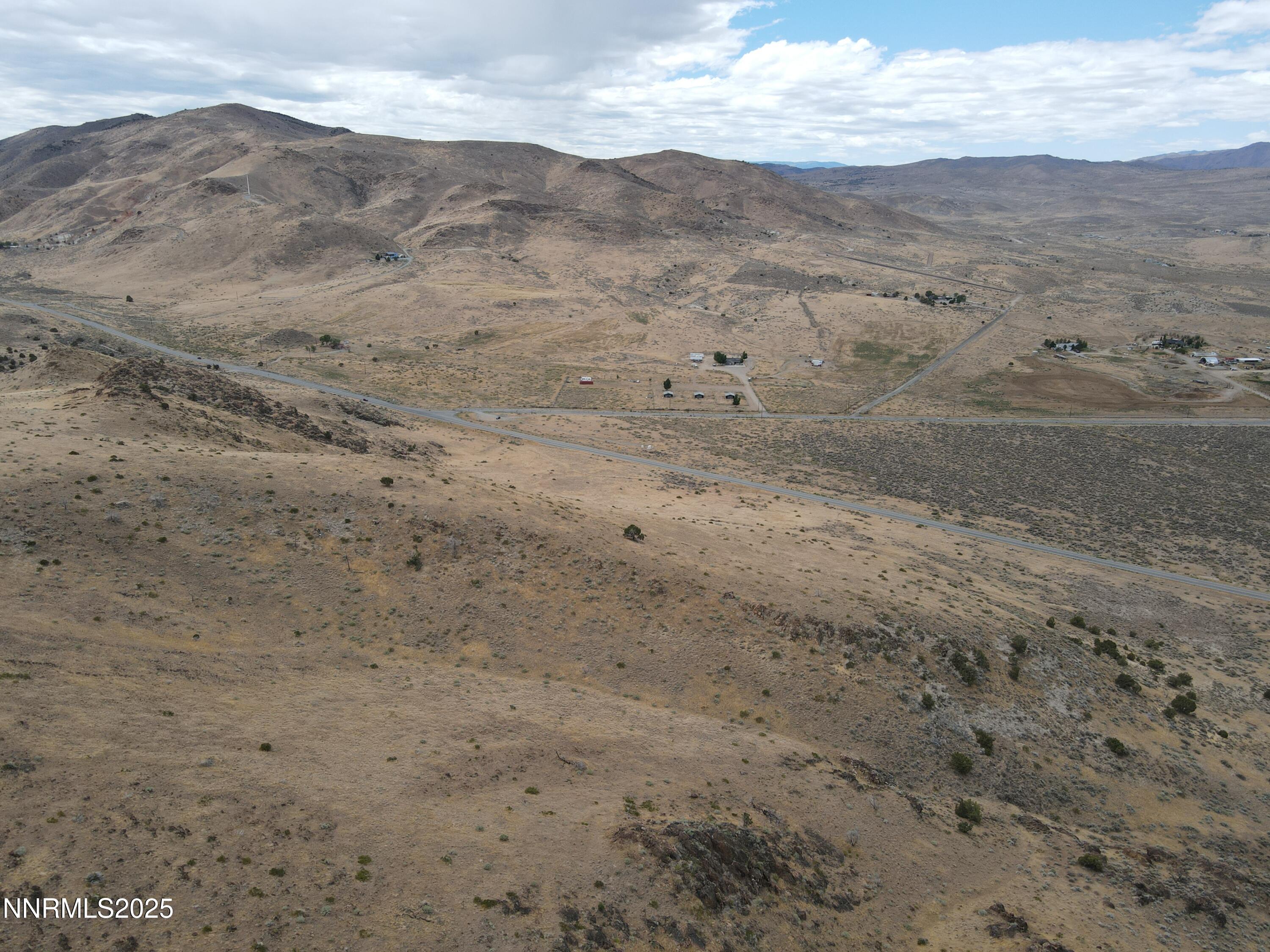 0 Pyramid (076-261-04) Way Reno, NV 89510 - Photo 12 of 43 a view of a dry field with mountains in the background