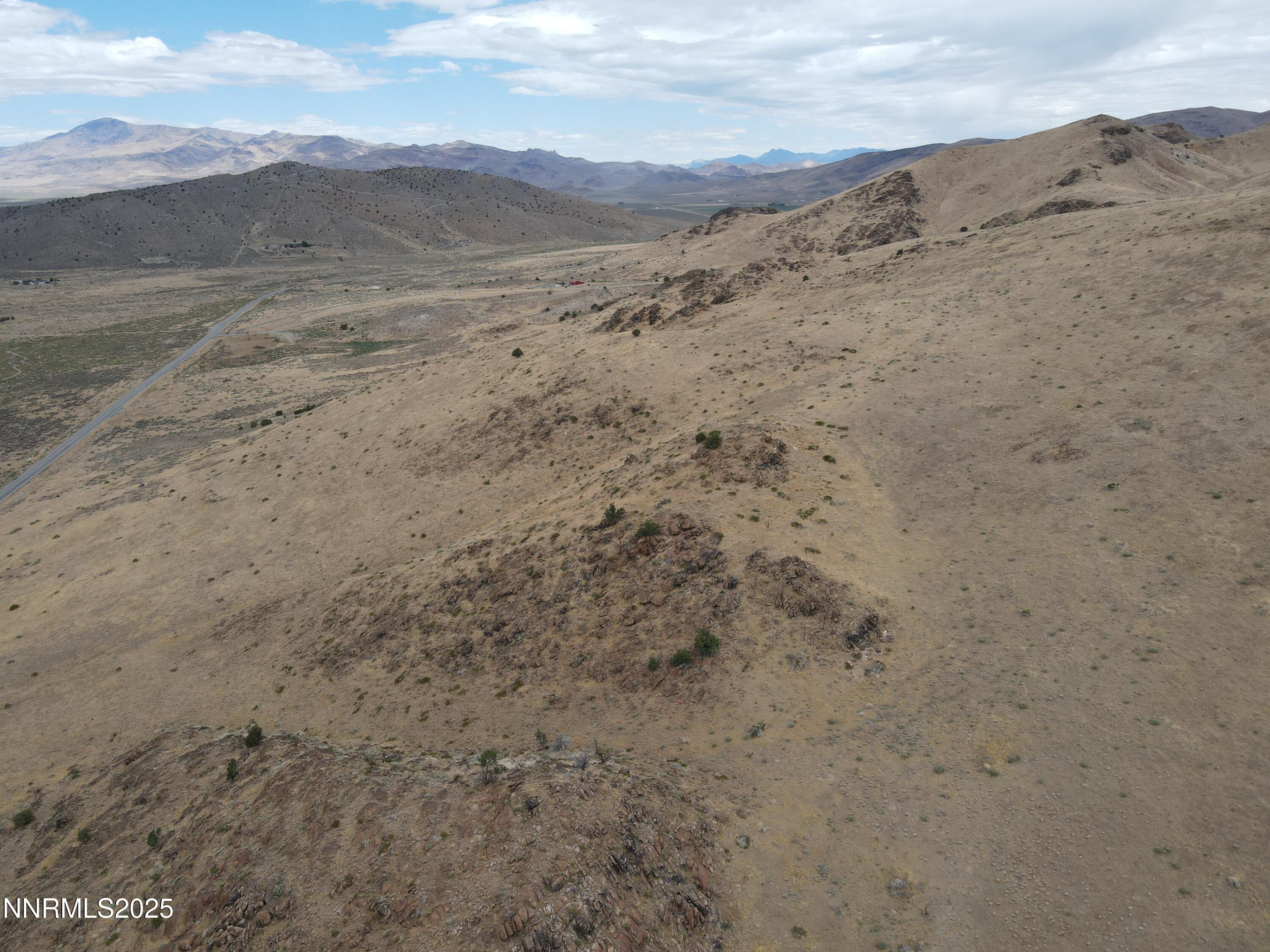 0 Pyramid (076-261-04) Way Reno, NV 89510 - Photo 28 of 43 a view of a dry field with mountains in the background