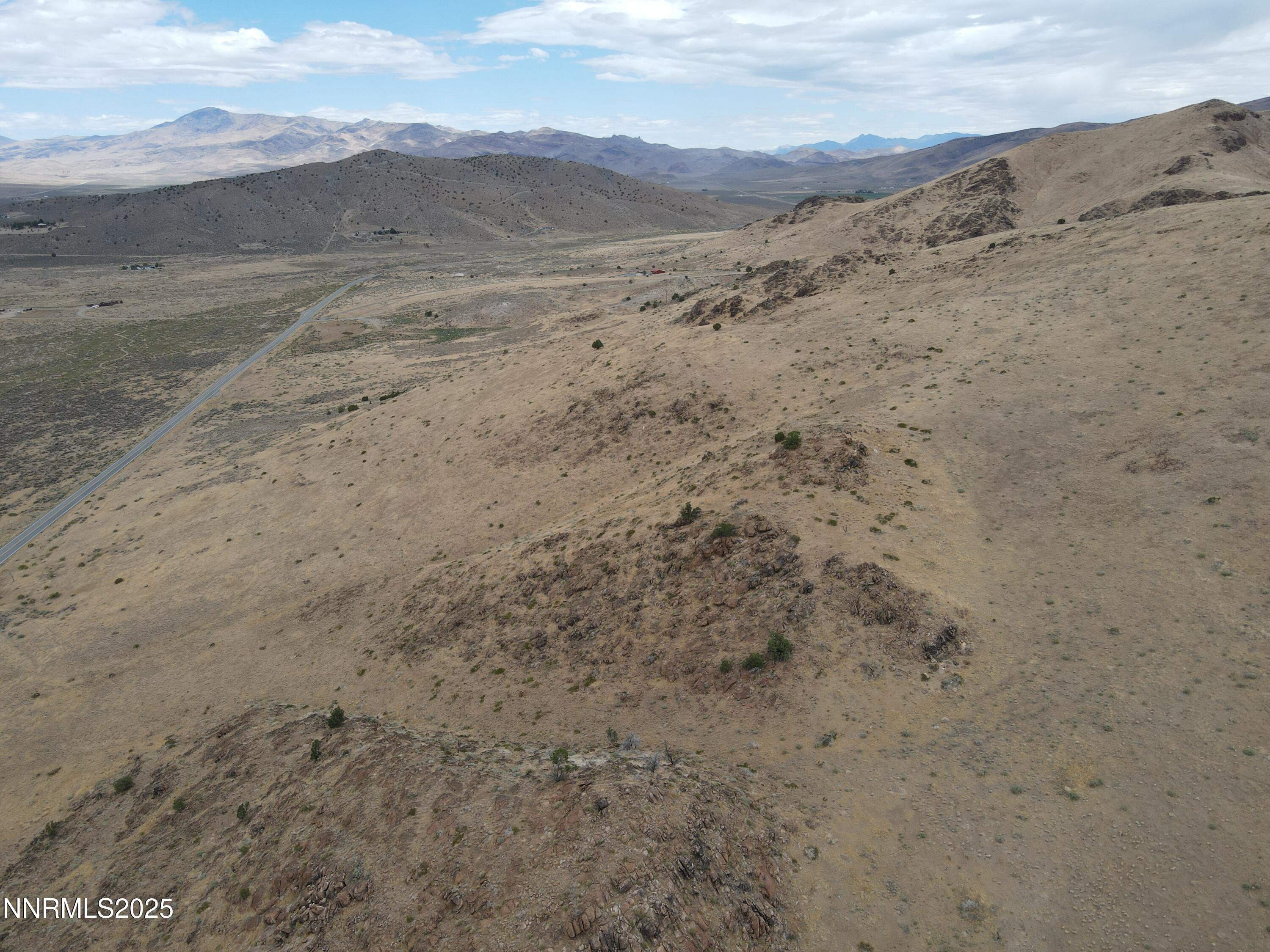 0 Pyramid (076-261-04) Way Reno, NV 89510 - Photo 29 of 43 a view of a dry yard with mountains in the background