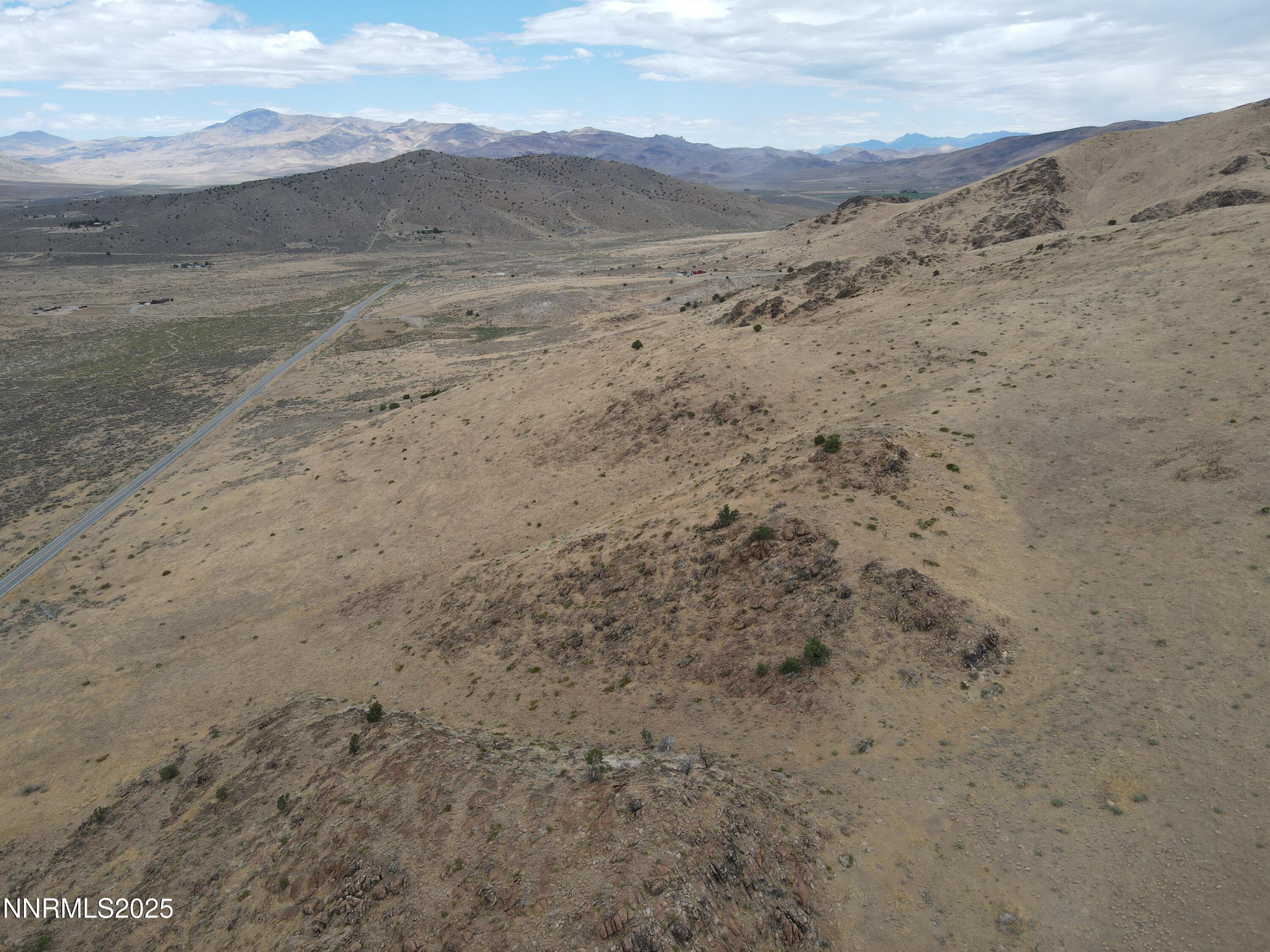 0 Pyramid (076-261-04) Way Reno, NV 89510 - Photo 30 of 43 a view of a dry field with mountains in the background