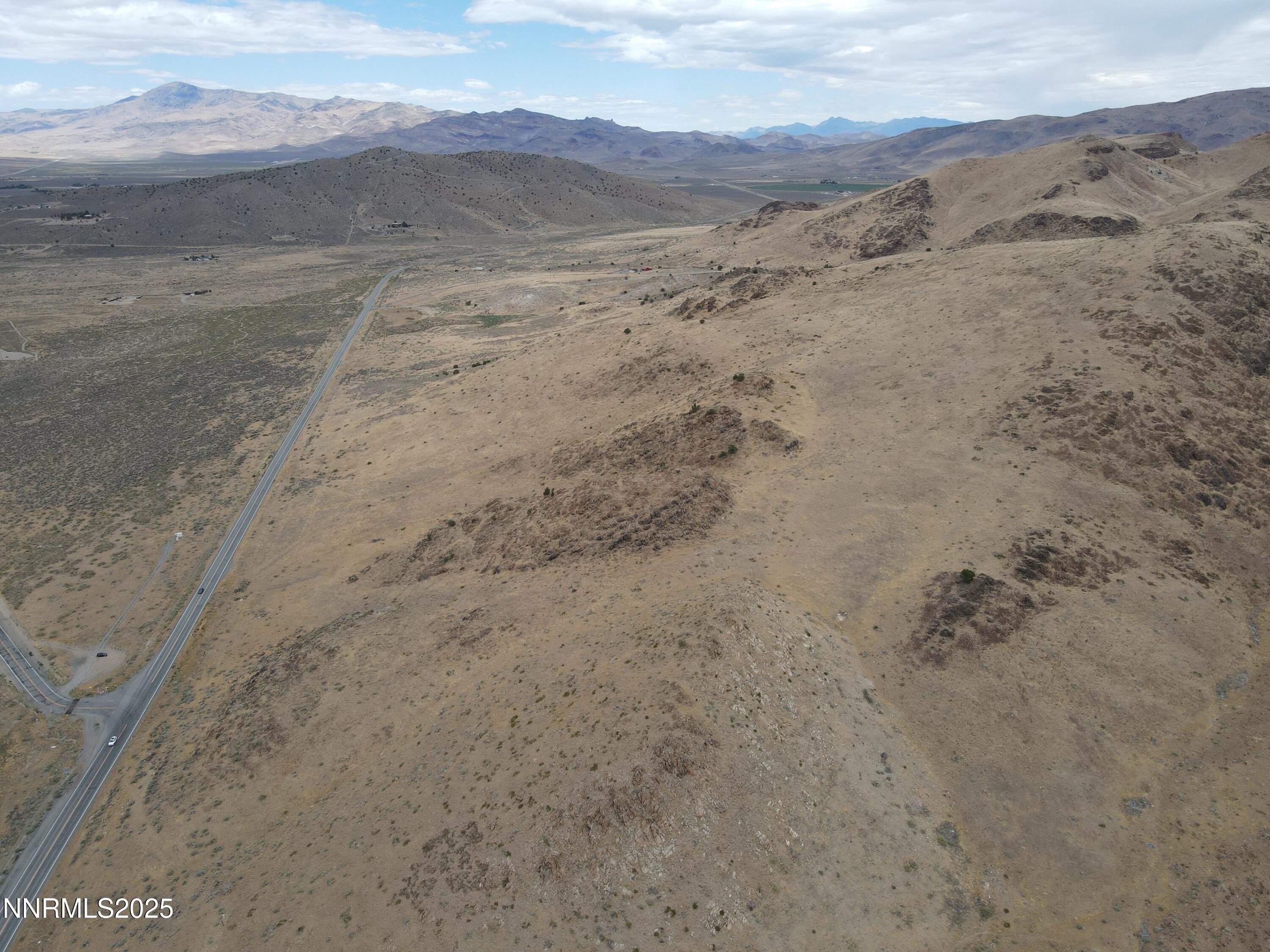 0 Pyramid (076-261-04) Way Reno, NV 89510 - Photo 34 of 43 a view of a dry yard with mountains in the background