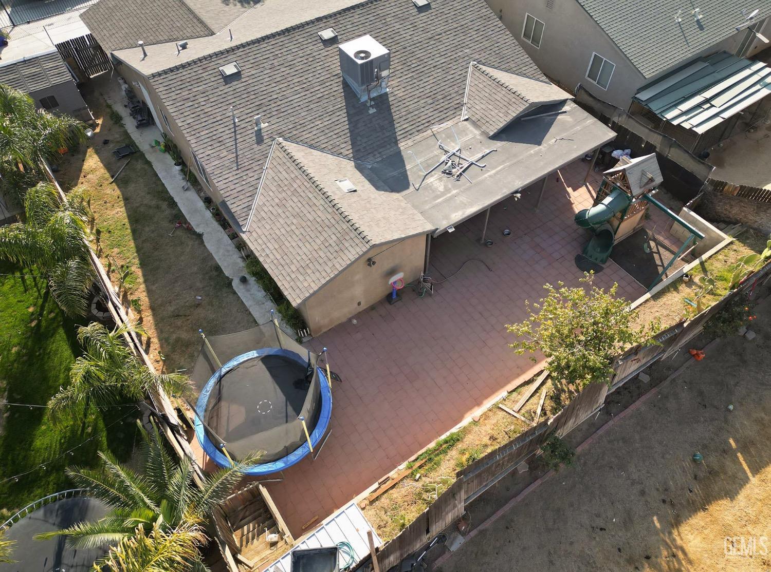 Undisclosed Address Bakersfield, CA 93306 - Photo 20 of 21 an aerial view of a house with a yard
