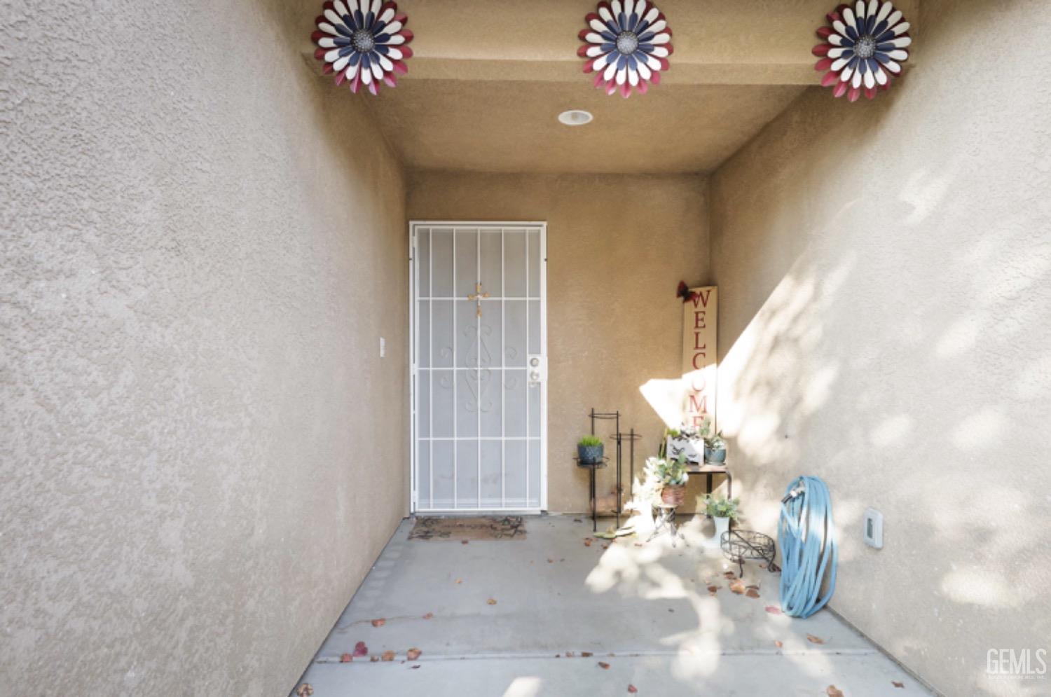Undisclosed Address Bakersfield, CA 93306 - Photo 3 of 21 a view of a livingroom with a chandelier