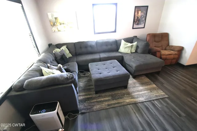a living room with furniture and a couch