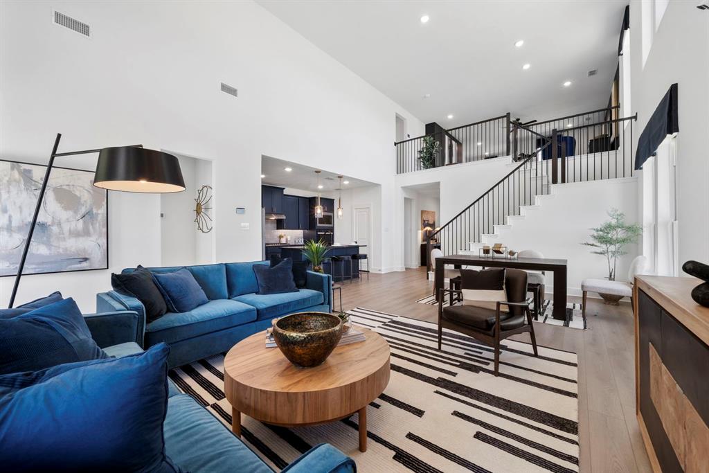 9301 Shadow Trail Little Elm, TX 75068 - Photo 5 of 10 a living room with furniture and a potted plant