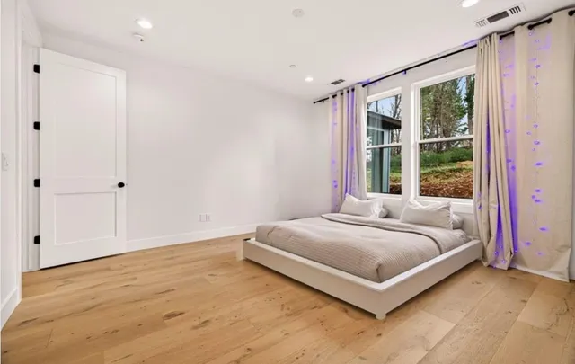a bathroom with sinks mirror and vanity