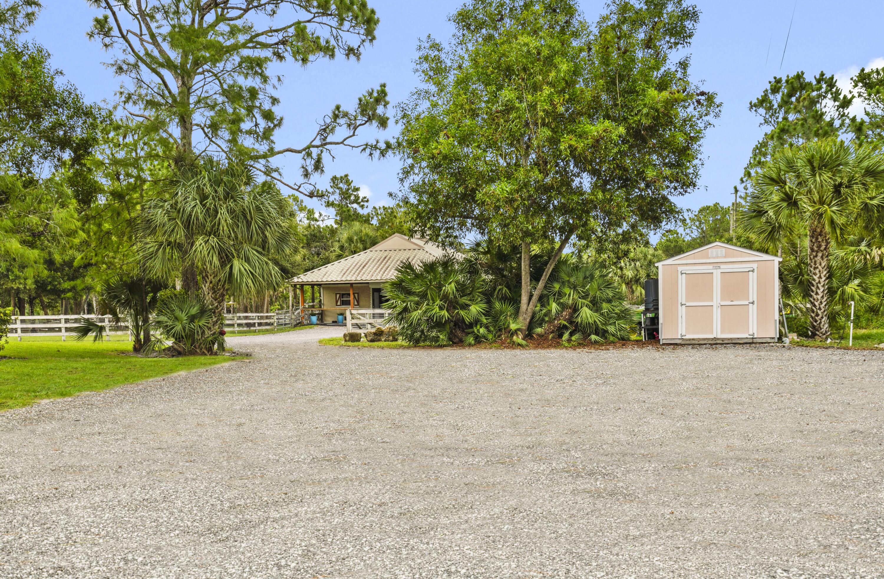 2560 Buck Ridge Trail Loxahatchee, FL 33470 - Photo 49 of 65 Driveway to Barn