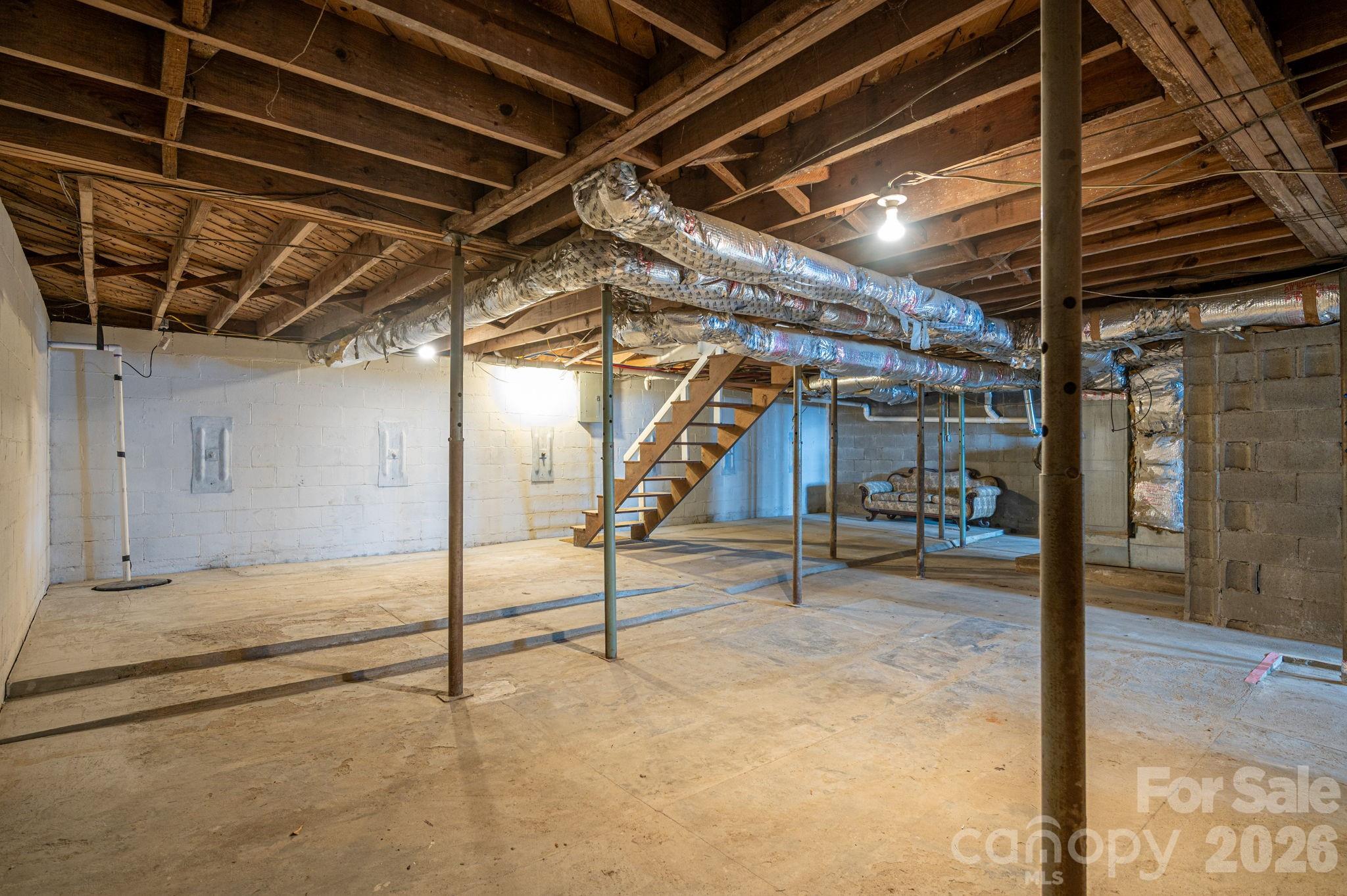 610 Washington Street Cramerton, NC 28032 - Photo 37 of 41 a view of an empty room with wooden floor