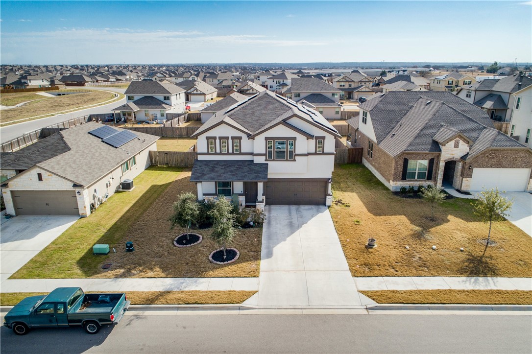 5805 Liguria Cove Round Rock, TX 78665 - Photo 1 of 1 an aerial view of a house with a garden