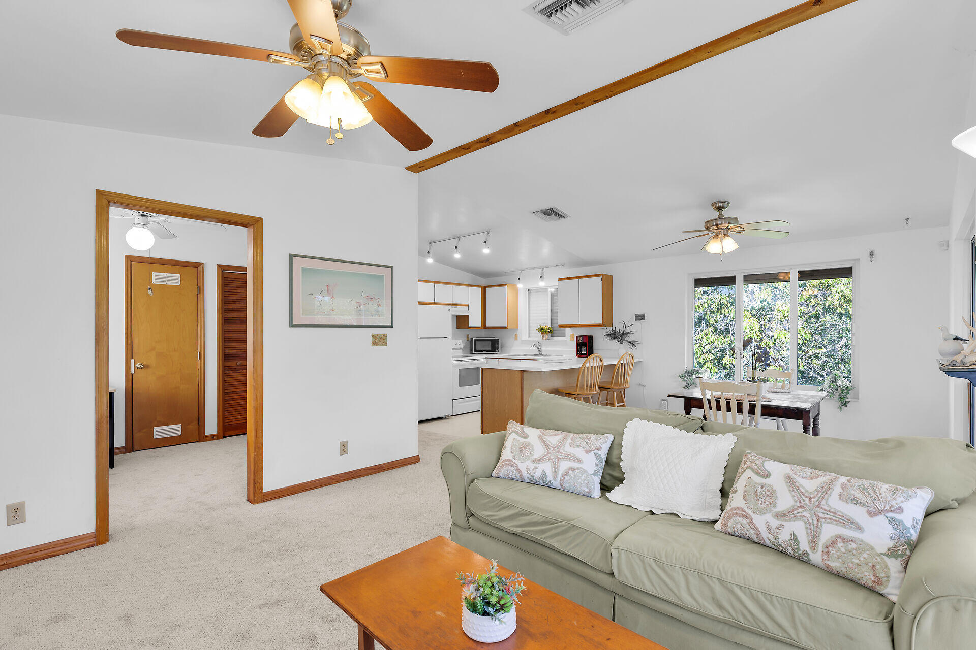 30625 16th Lane Big Pine Key, FL 33043 - Photo 12 of 42 a living room with furniture and a large window