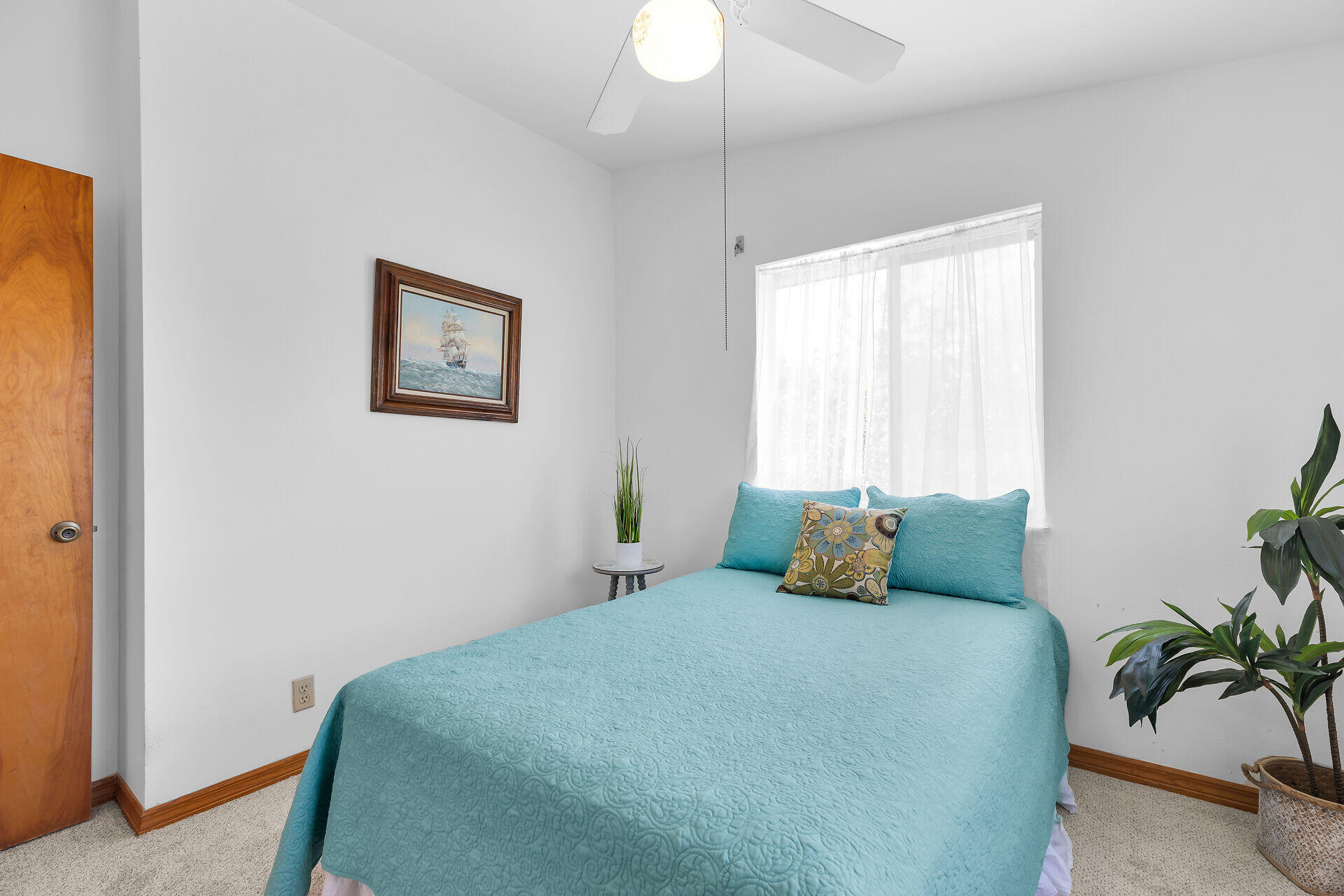 30625 16th Lane Big Pine Key, FL 33043 - Photo 29 of 42 a bedroom with a bed and a window