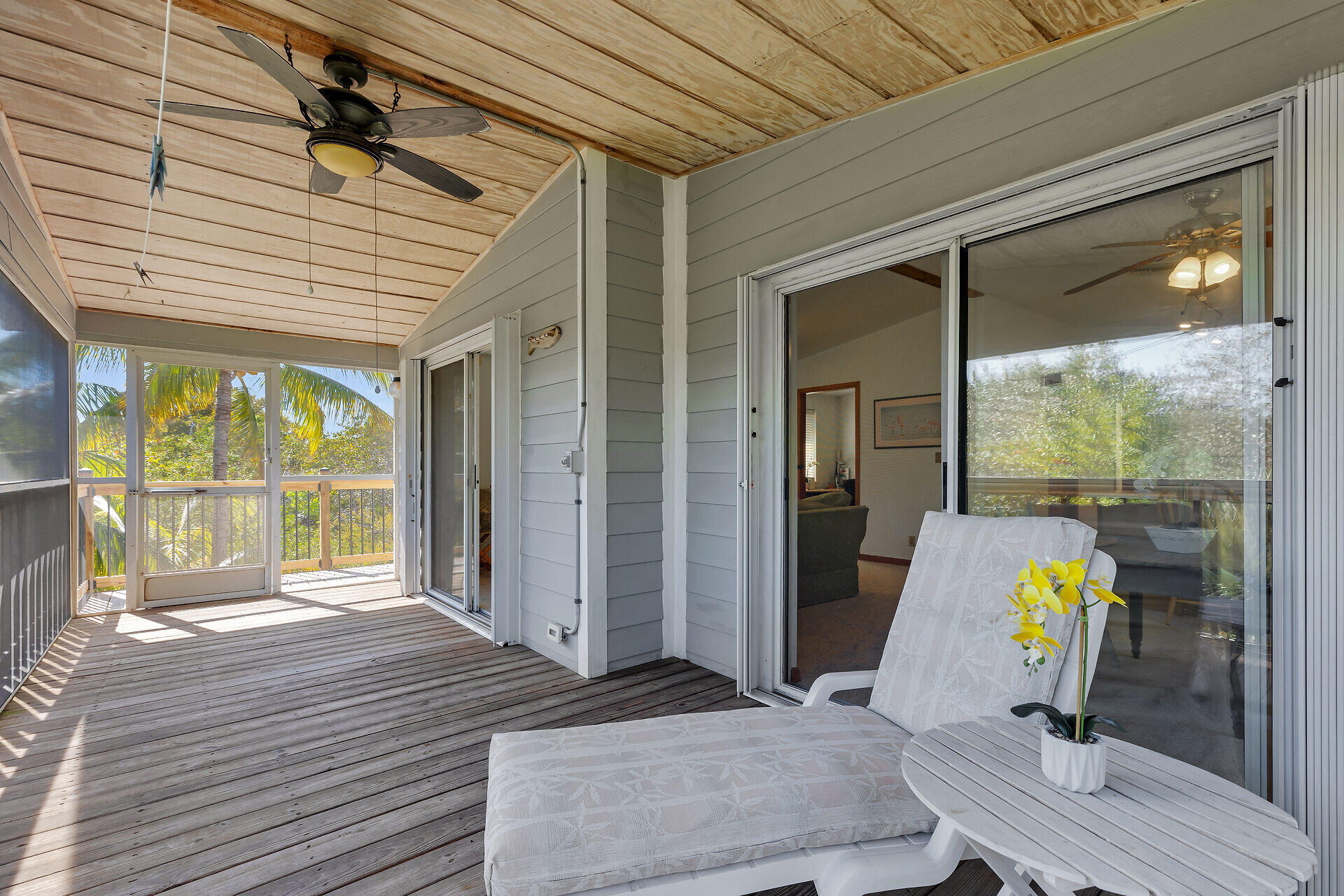 30625 16th Lane Big Pine Key, FL 33043 - Photo 4 of 42 a bedroom with a bed and a large window