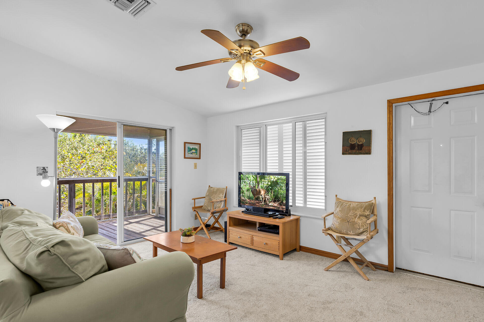 30625 16th Lane Big Pine Key, FL 33043 - Photo 9 of 42 a living room with furniture and a window
