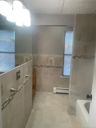 a bathroom with a bathtub