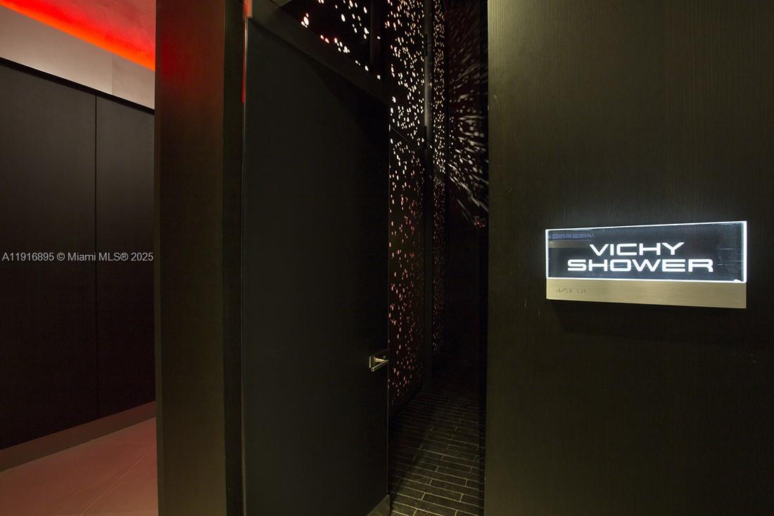 18555 Collins Avenue, Unit 3505 Sunny Isles Beach, FL 33160 - Photo 46 of 52 a view of a hallway