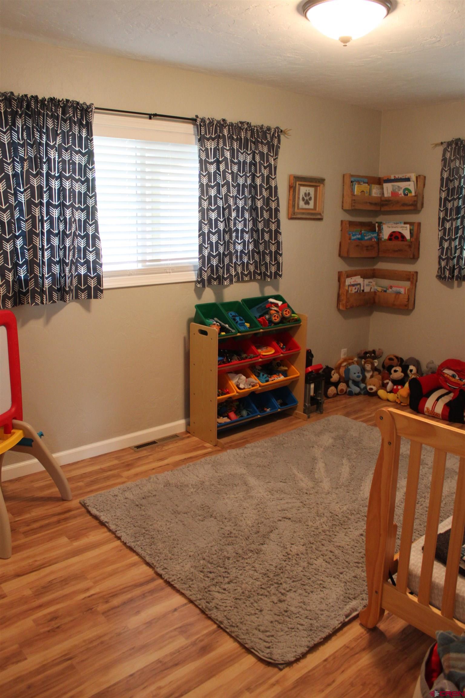 20976 6840th Road Montrose, CO 81403 - Photo 12 of 33 a room with furniture and a window