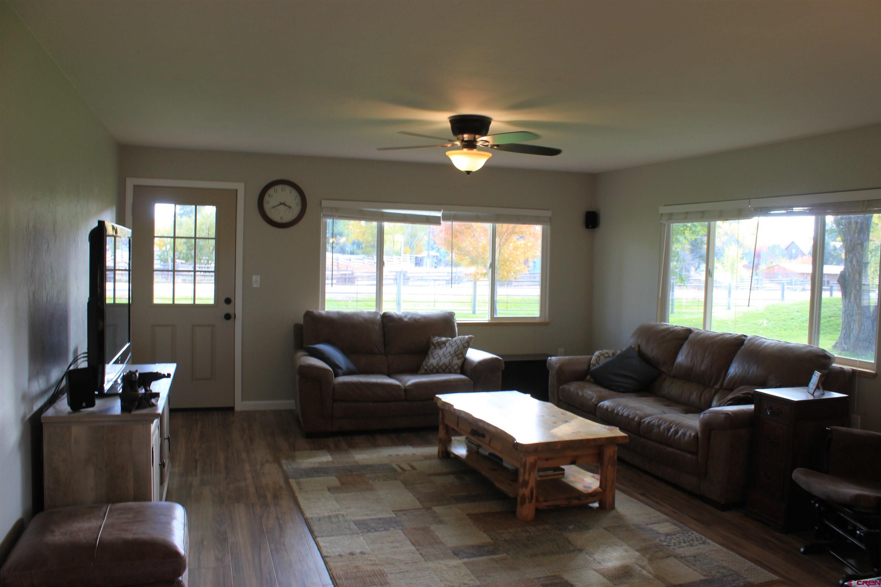 20976 6840th Road Montrose, CO 81403 - Photo 10 of 33 a living room with furniture and a window