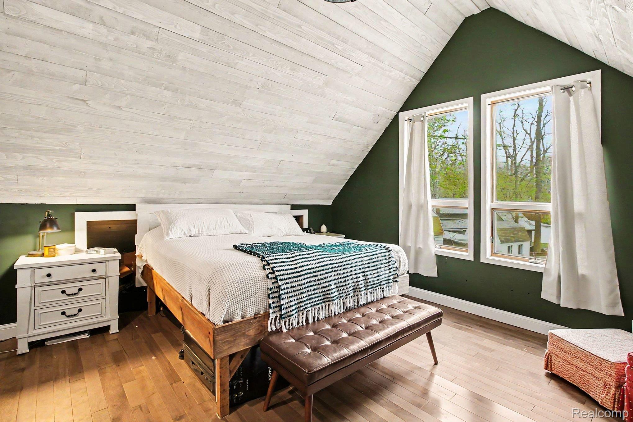 4375 Skinner Lake Road Lapeer, MI 48446 - Photo 20 of 30 Bedroom with light wood-style flooring and wooden ceiling