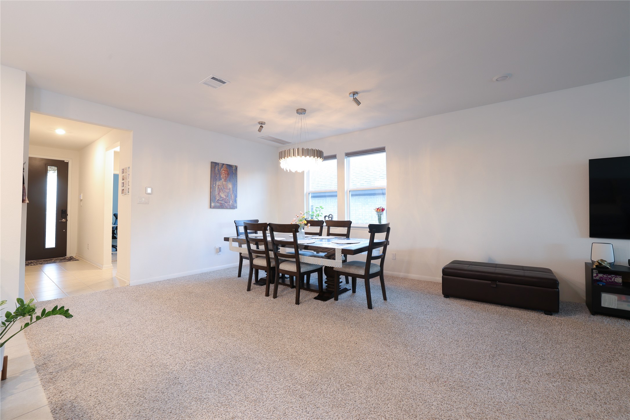 232 Barton Oak Trail Georgetown, TX 78628 - Photo 4 of 19 Dining room with light carpet, recessed lighting, and light tile patterned floors