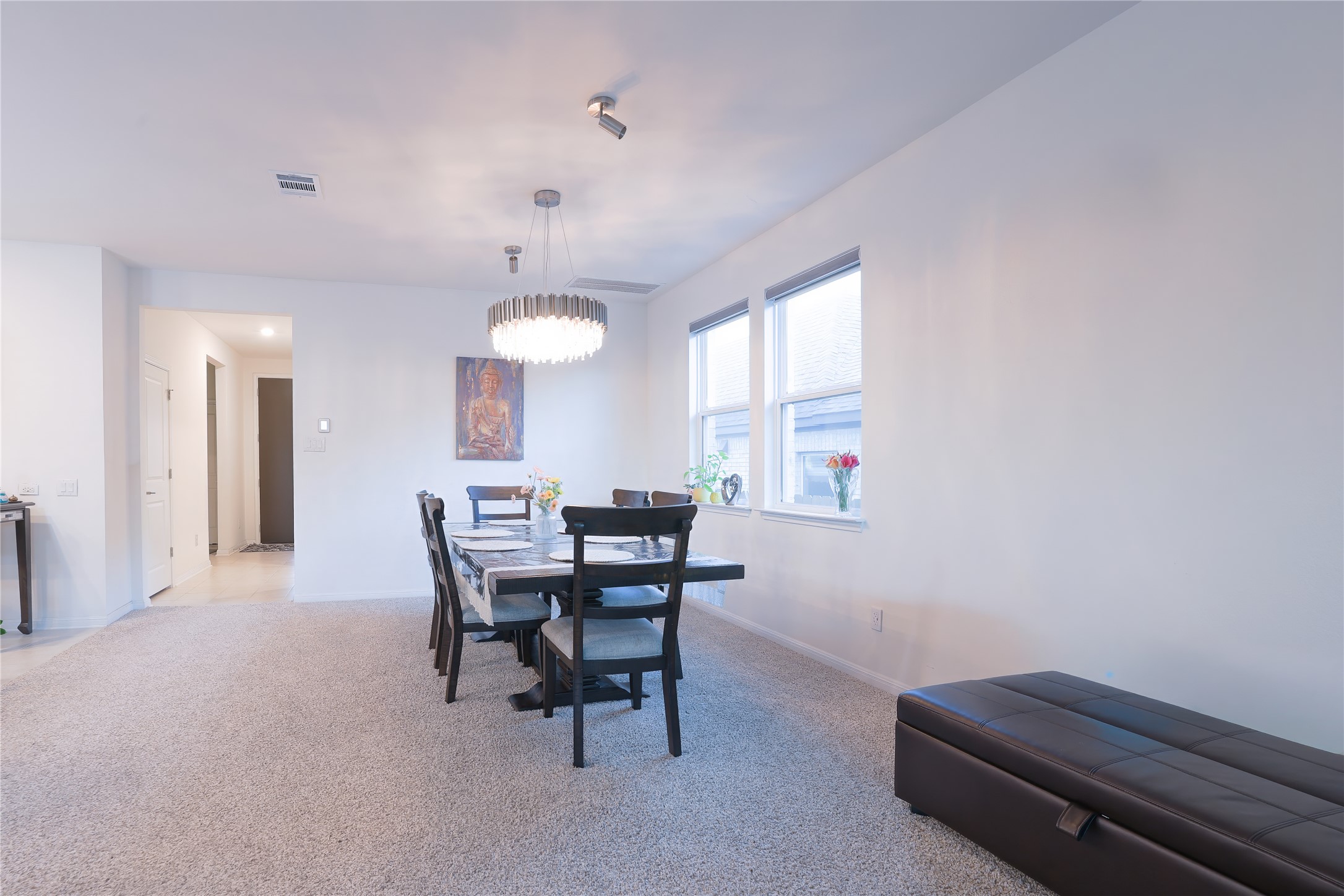 232 Barton Oak Trail Georgetown, TX 78628 - Photo 6 of 19 Dining area featuring light carpet and hanging lights