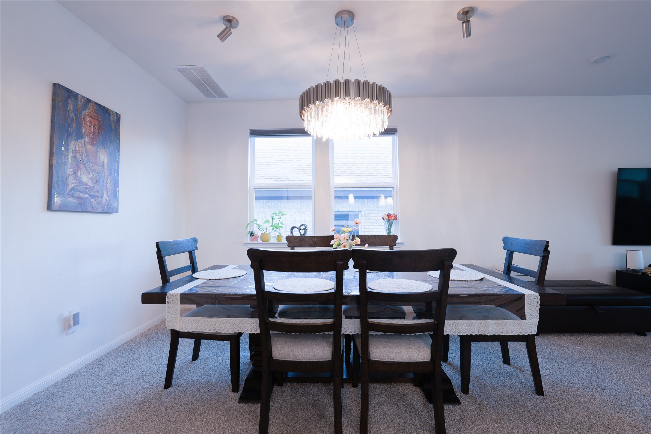 232 Barton Oak Trail Georgetown, TX 78628 - Photo 7 of 19 Dining area with carpet floors and hanging lights