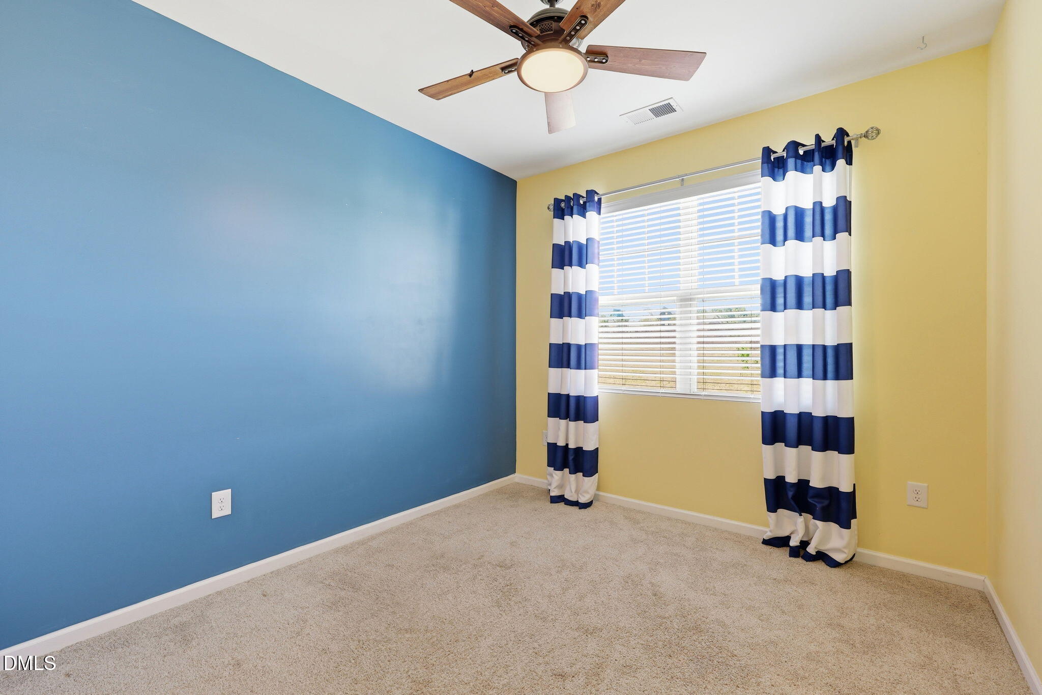 1808 Austin Rdg Parkway Wake Forest, NC 27587 - Photo 21 of 57 a view of a room with gym equipment and a chandelier fan