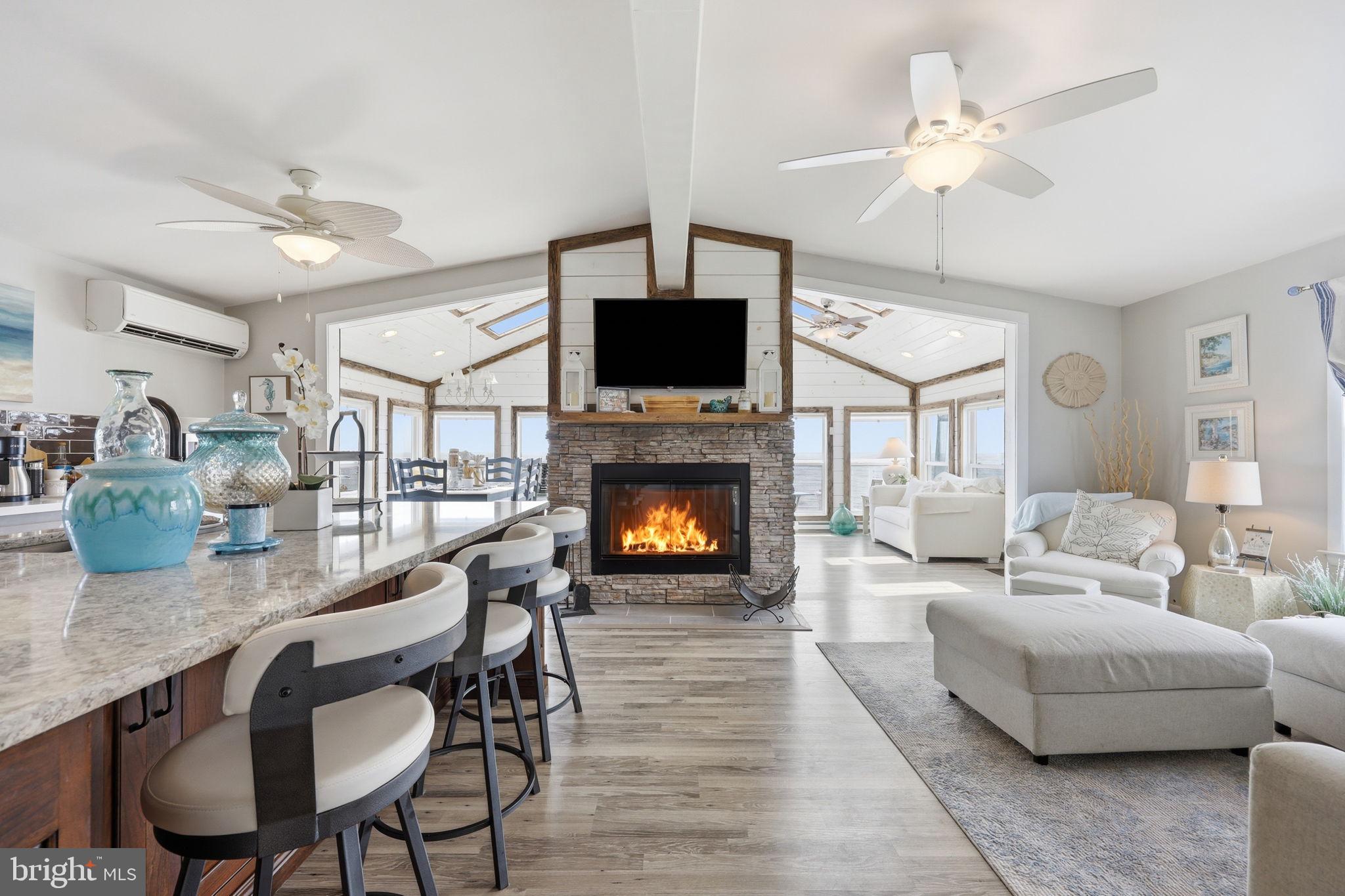 173 Cove Road Newport, NJ 08345 - Photo 72 of 72 a living room with furniture and a fireplace