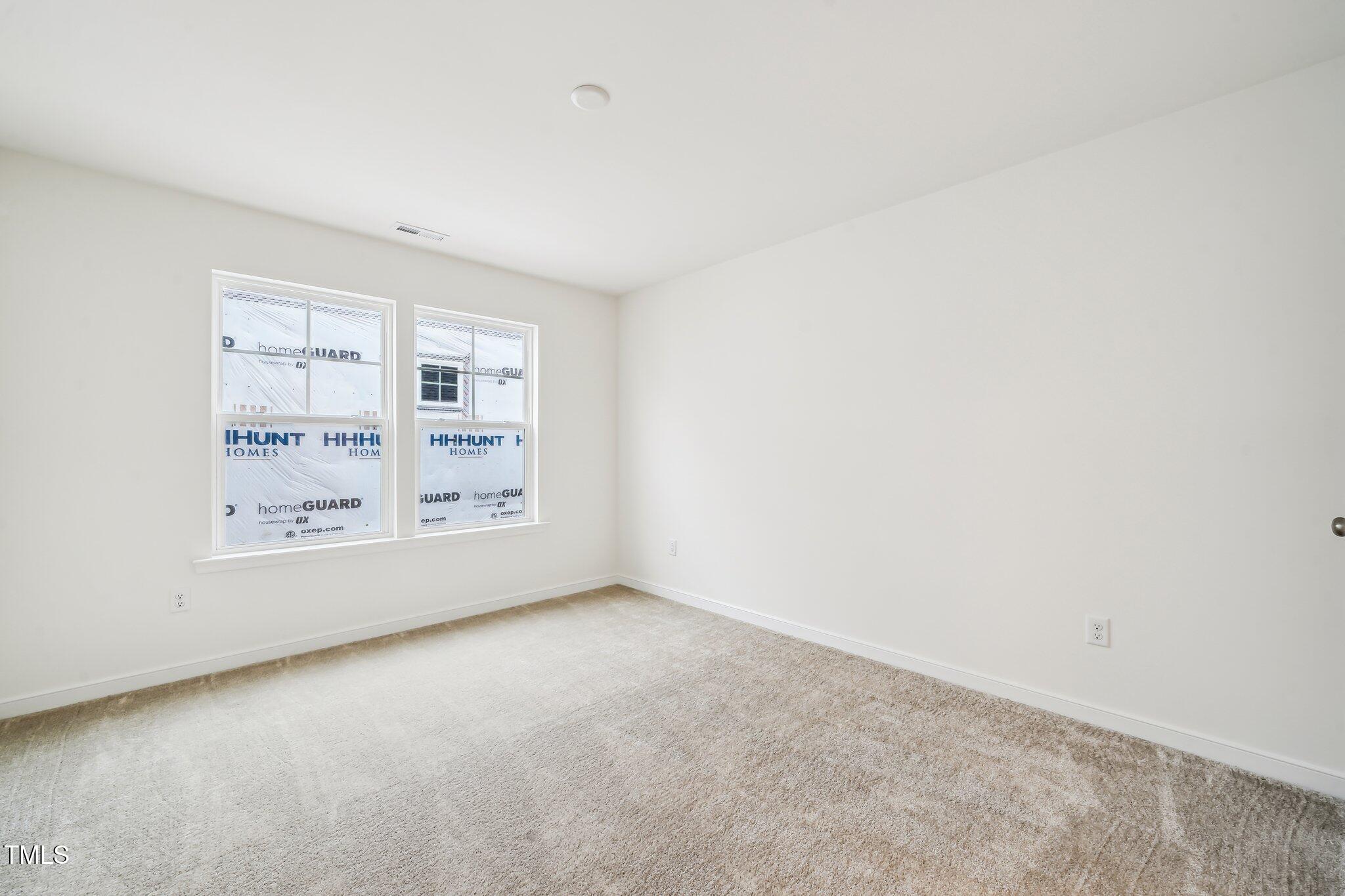 149 Cribbs Lane Middlesex, NC 27557 - Photo 22 of 33 an empty room with a window