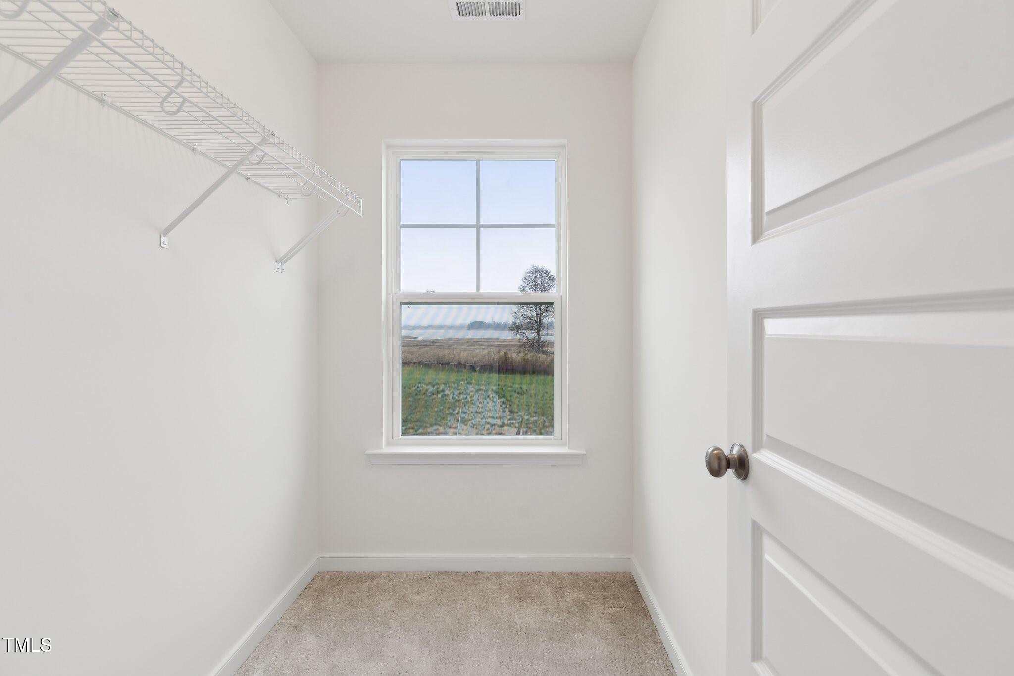 149 Cribbs Lane Middlesex, NC 27557 - Photo 23 of 33 a view of an empty room with a window