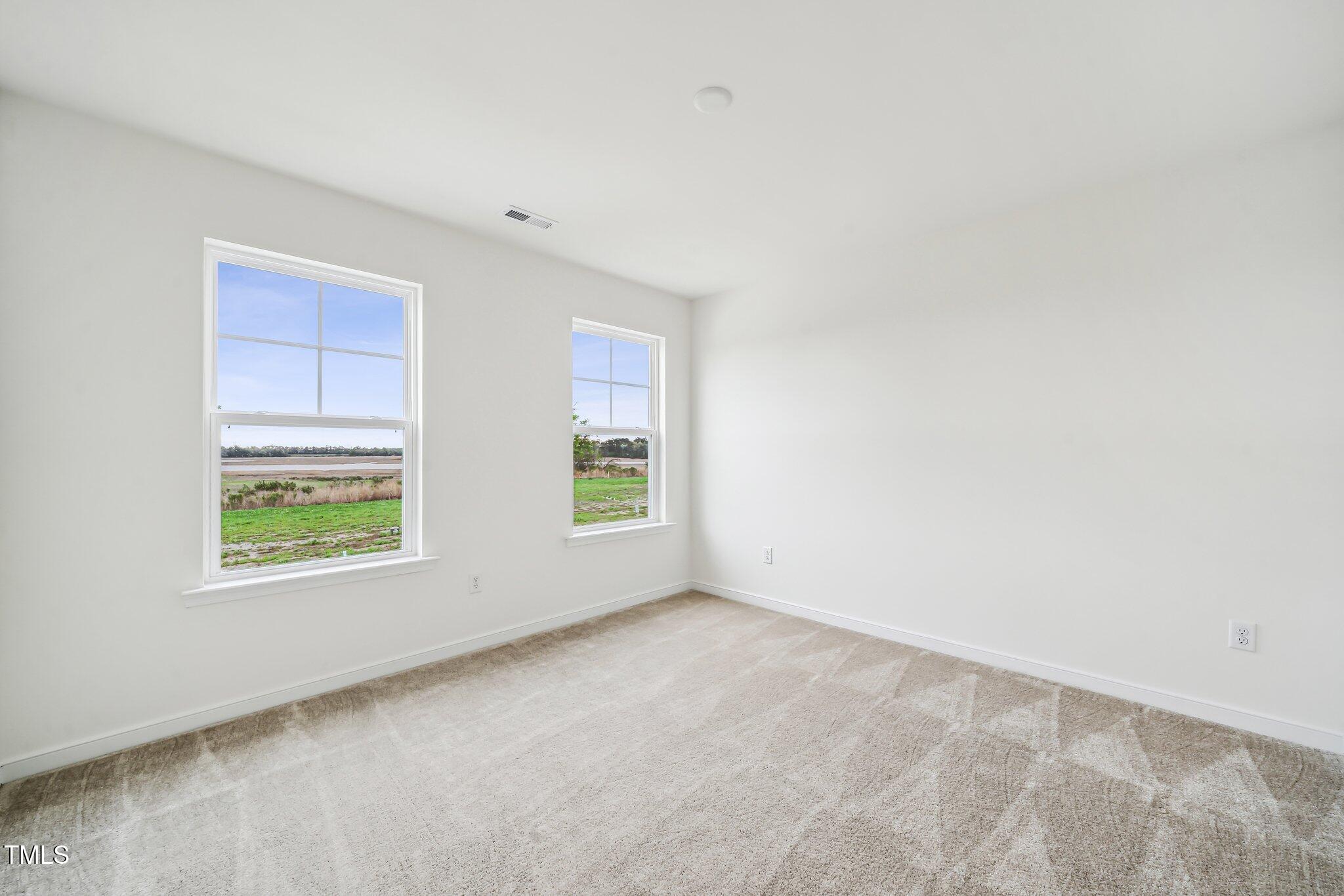 149 Cribbs Lane Middlesex, NC 27557 - Photo 25 of 33 an empty room with windows