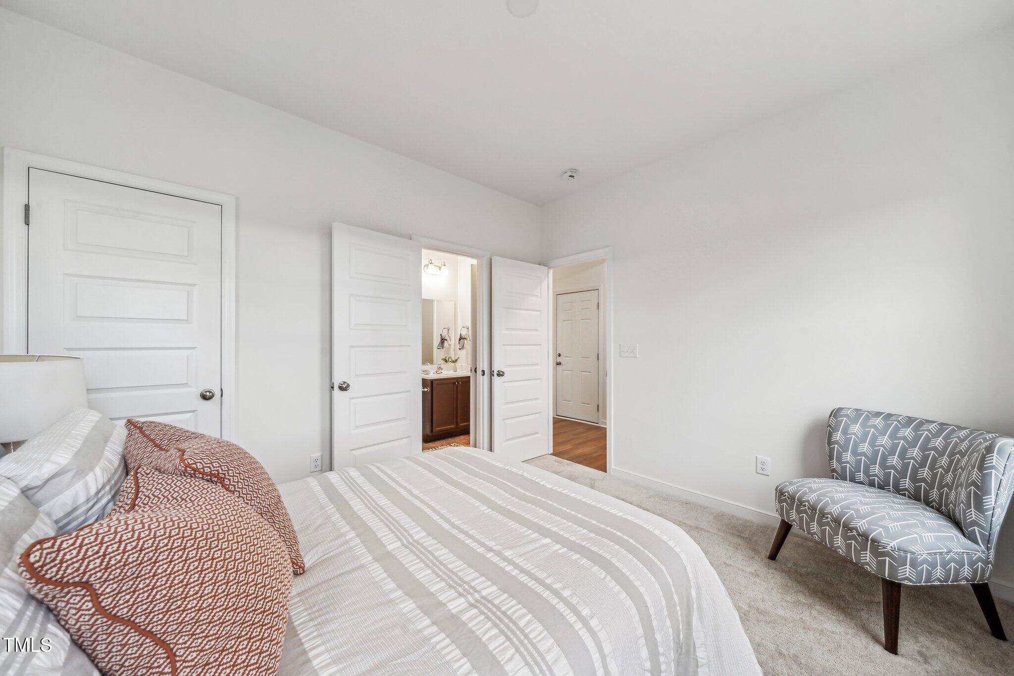 149 Cribbs Lane Middlesex, NC 27557 - Photo 4 of 33 a bedroom with a bed and couch