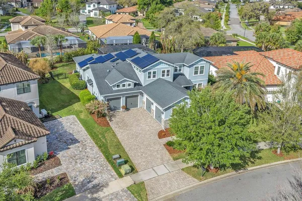 an aerial view of a house with a garden