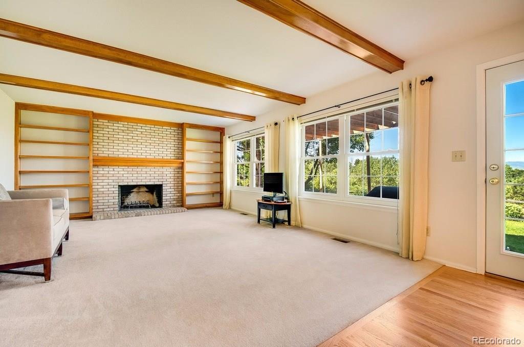 8927 Mountain Laurel Way Highlands Ranch, CO 80126 - Photo 14 of 35 a view of a livingroom with furniture and a window