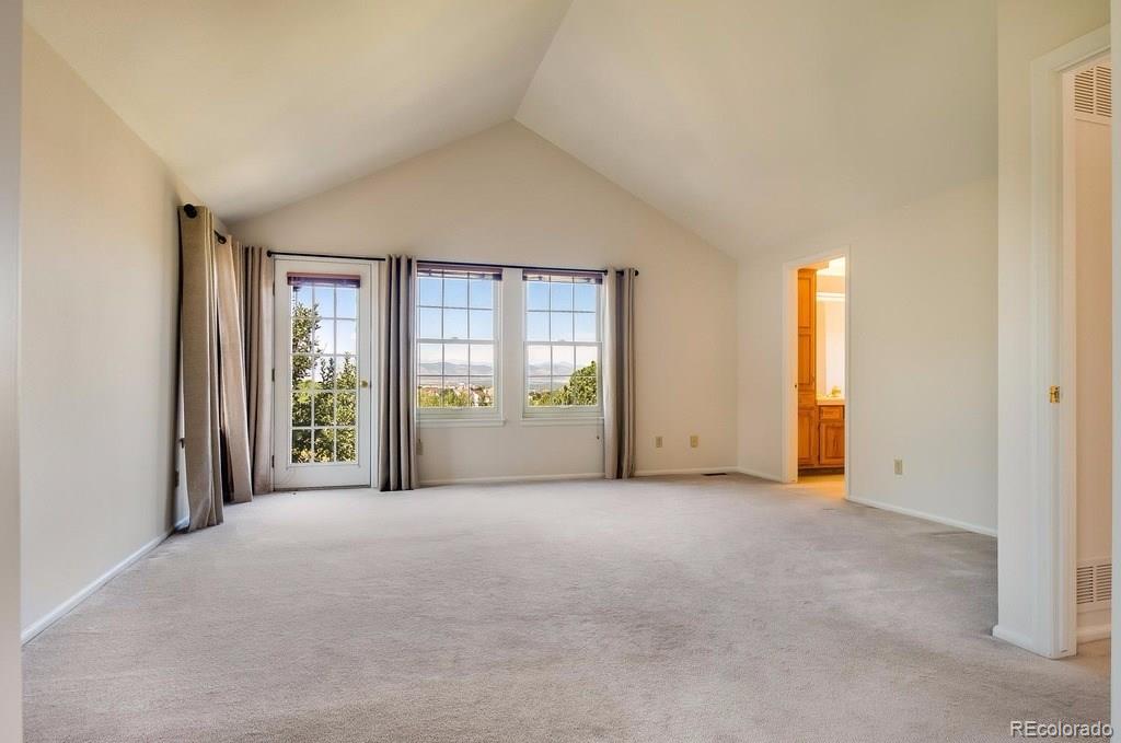 8927 Mountain Laurel Way Highlands Ranch, CO 80126 - Photo 18 of 35 an empty room with windows and closet