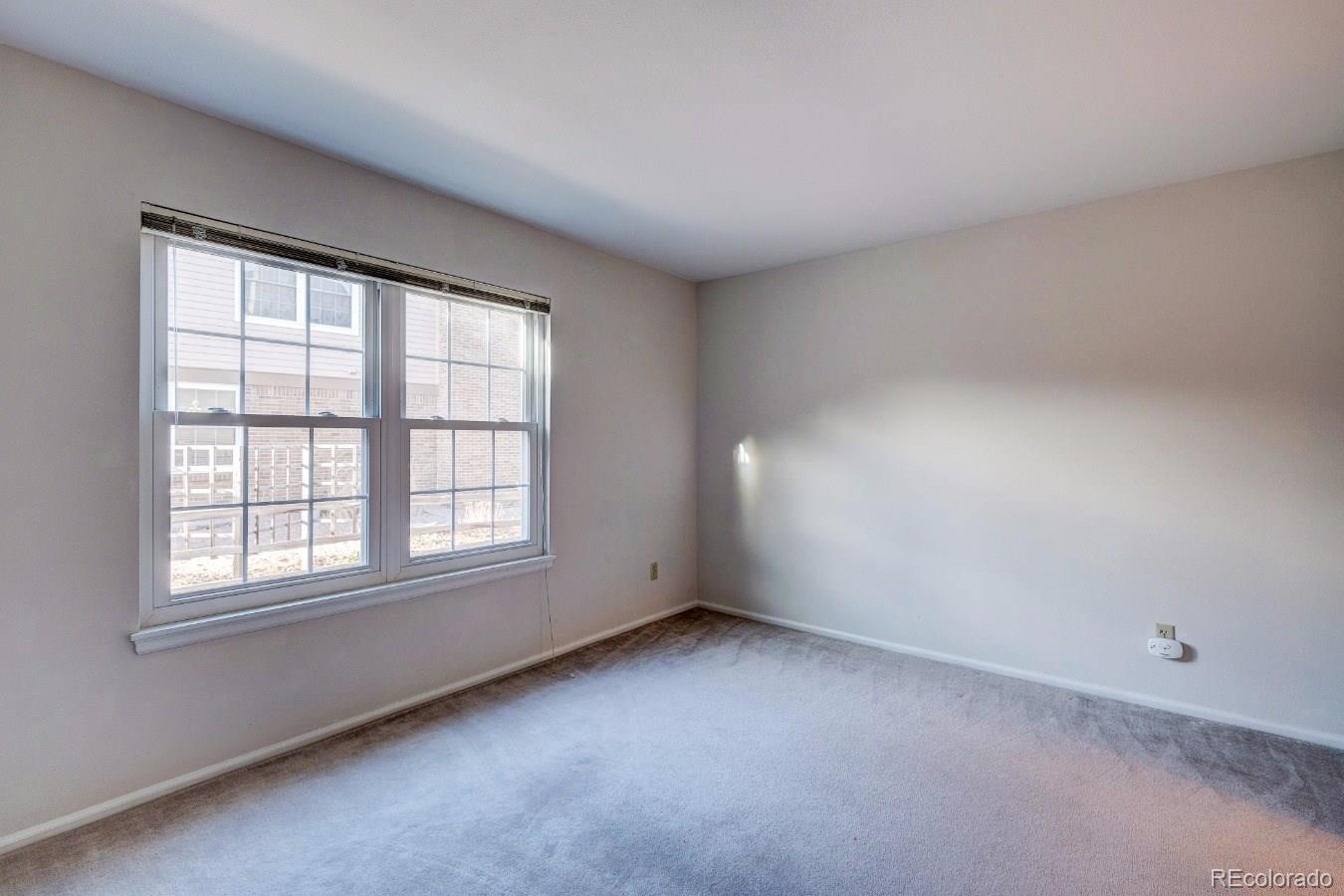 8927 Mountain Laurel Way Highlands Ranch, CO 80126 - Photo 23 of 35 an empty room with a window