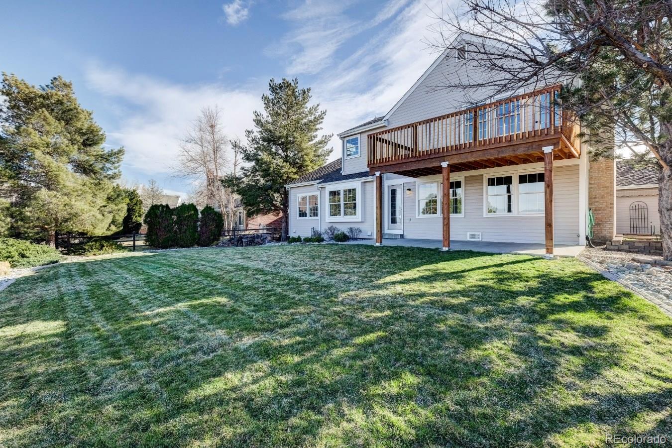 8927 Mountain Laurel Way Highlands Ranch, CO 80126 - Photo 29 of 35 front view of house with a yard