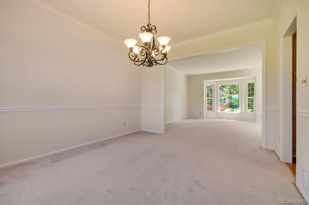 8927 Mountain Laurel Way Highlands Ranch, CO 80126 - Photo 7 of 35 a view of an empty room with a window