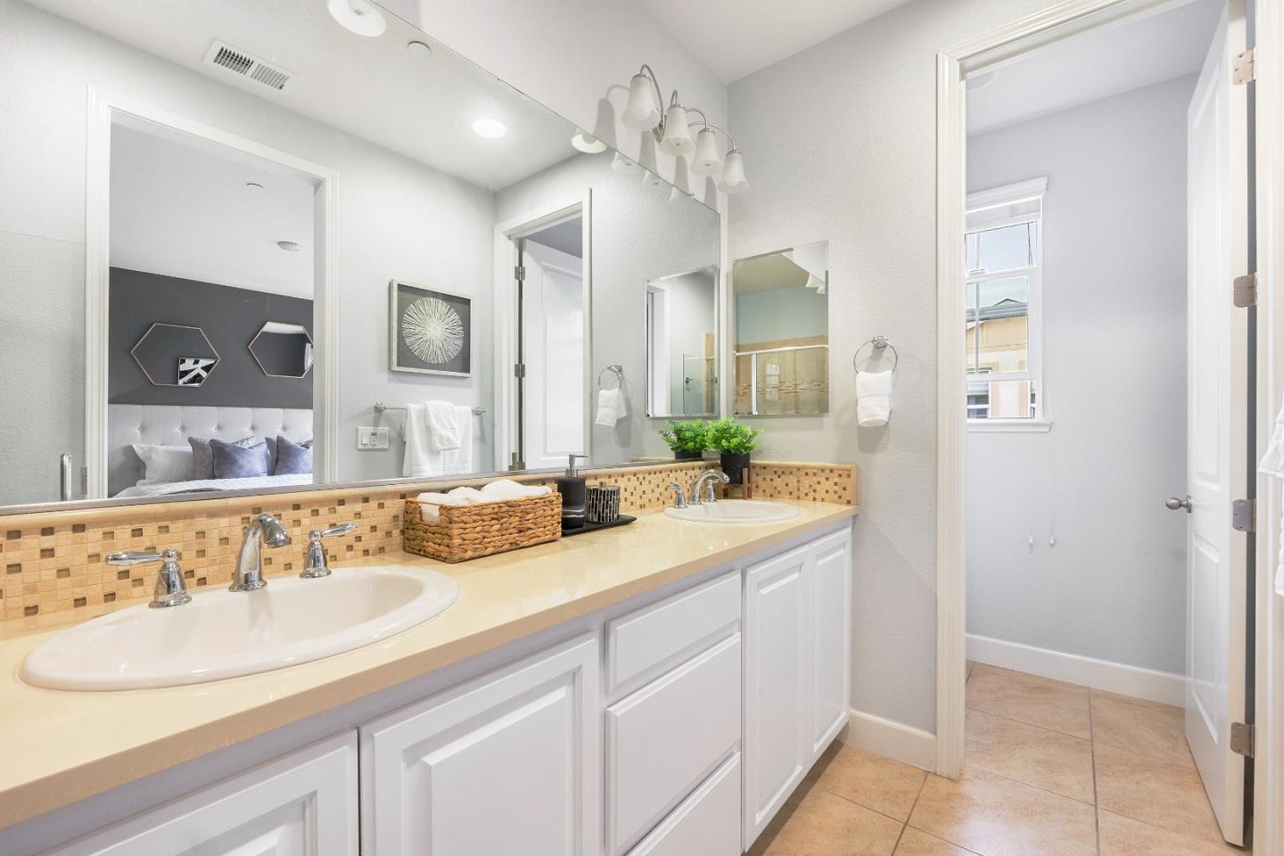 79 Braxton Terrace Campbell, CA 95008 - Photo 19 of 36 a bathroom with a sink and a mirror