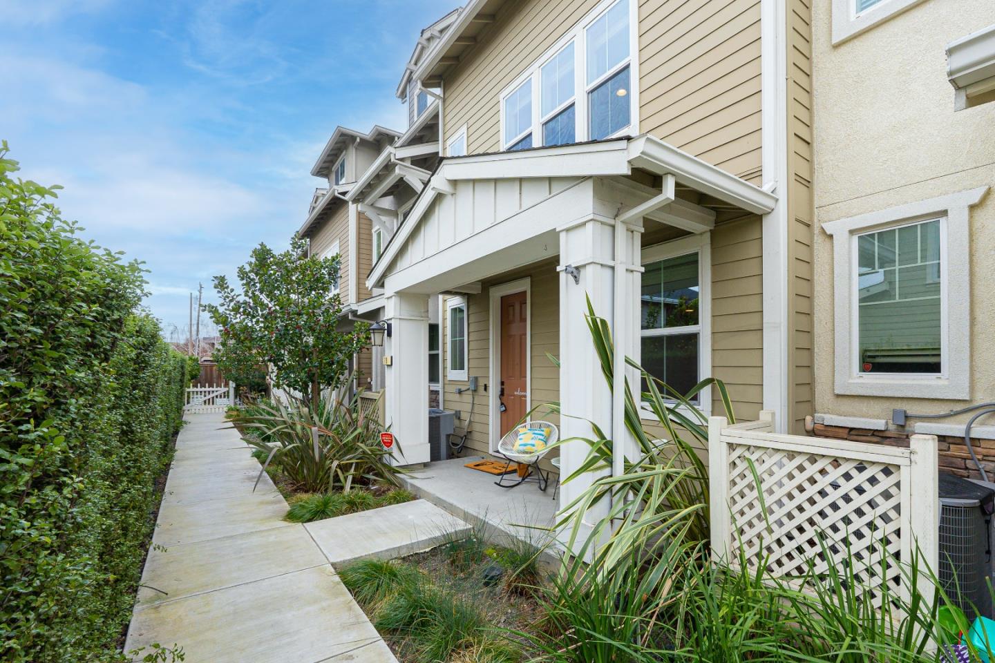 79 Braxton Terrace Campbell, CA 95008 - Photo 2 of 36 front view of a house with a large window and potted plants