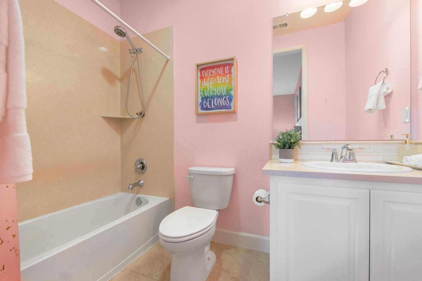 79 Braxton Terrace Campbell, CA 95008 - Photo 21 of 36 a bathroom with a granite countertop toilet sink and mirror