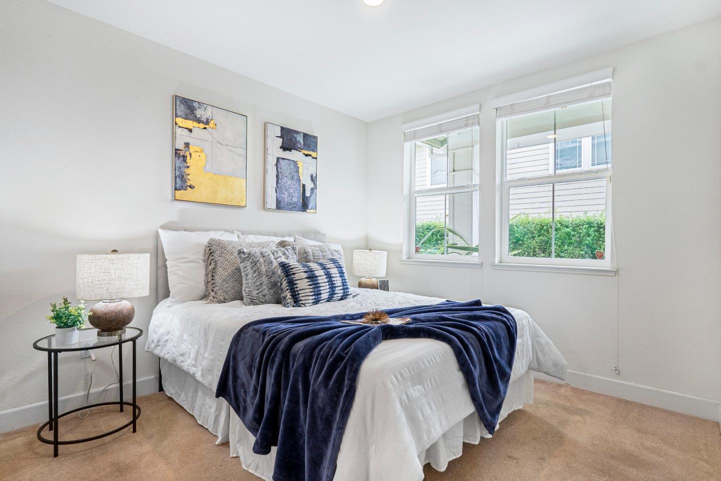 79 Braxton Terrace Campbell, CA 95008 - Photo 22 of 36 a bed sitting in a bedroom next to a window