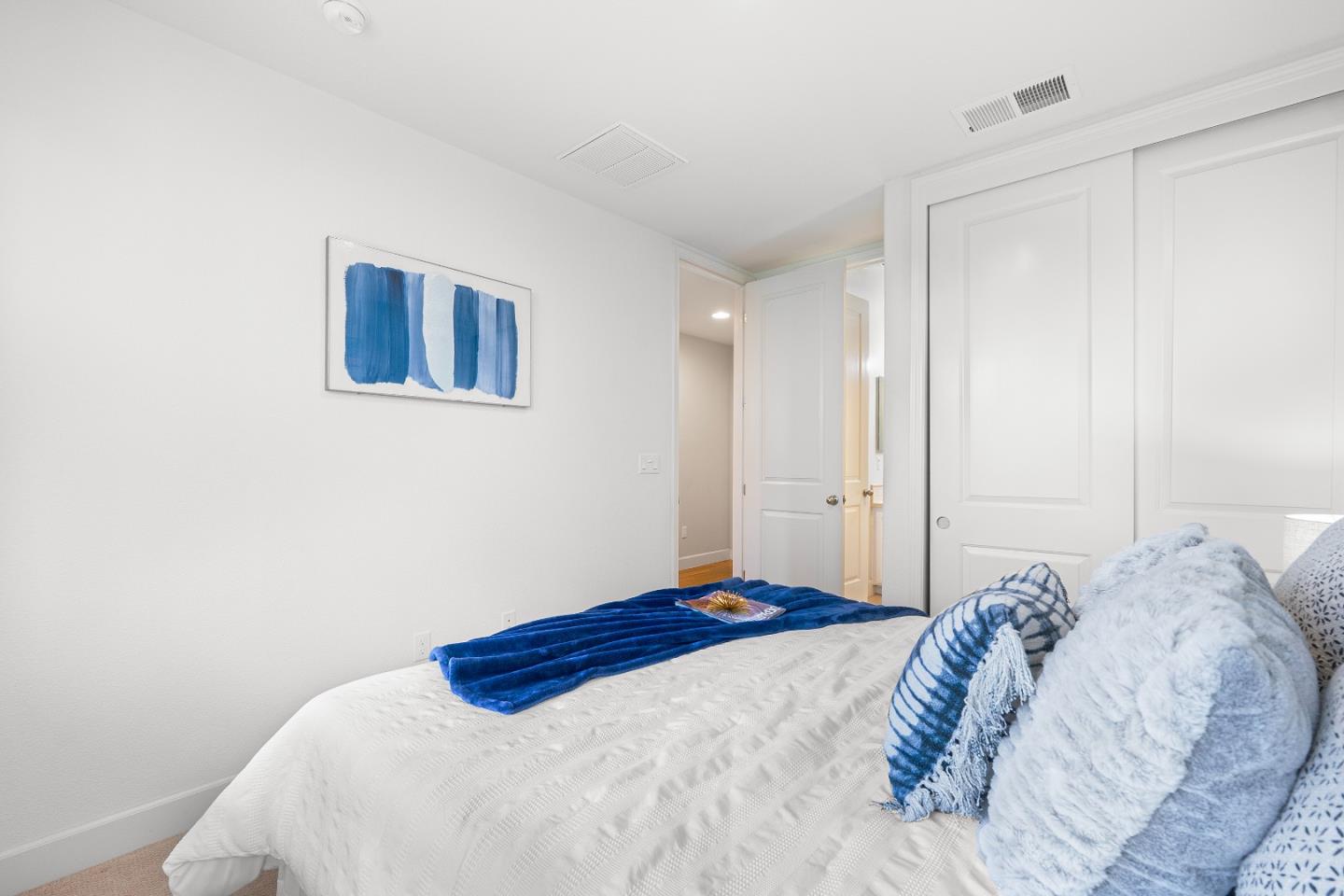 79 Braxton Terrace Campbell, CA 95008 - Photo 23 of 36 a bedroom with a bed and a painting on the wall