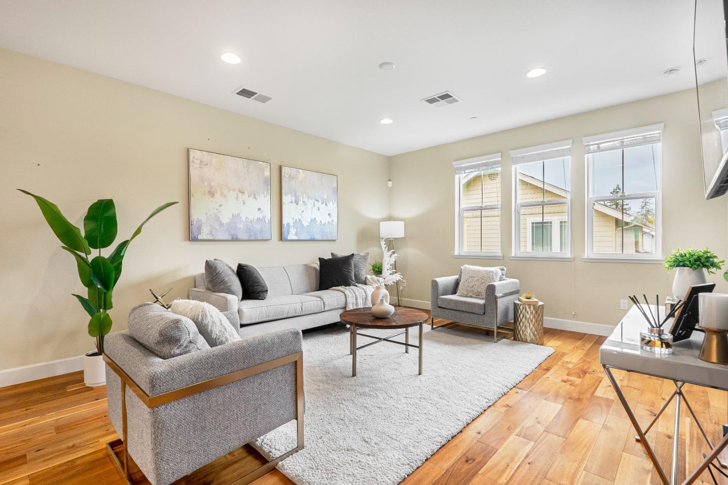 79 Braxton Terrace Campbell, CA 95008 - Photo 8 of 36 a living room with furniture or couch and a potted plant