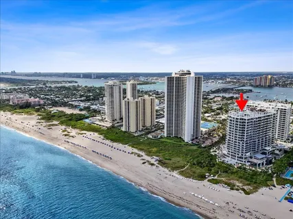 a view of building with city space and ocean view